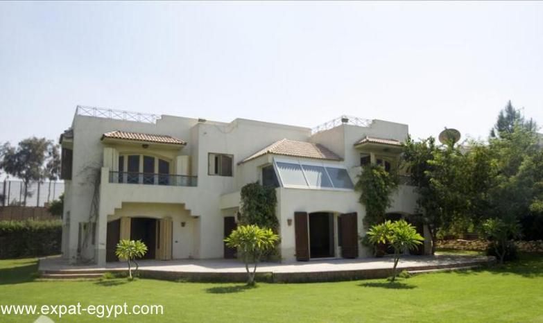 Villa overlooks the club house in \'Katr El Nada\' compound for Rent