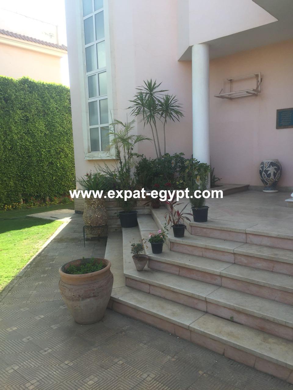 Villa for sale in Nada Compound , Sheikh Zayed City , Giza , Egypt .