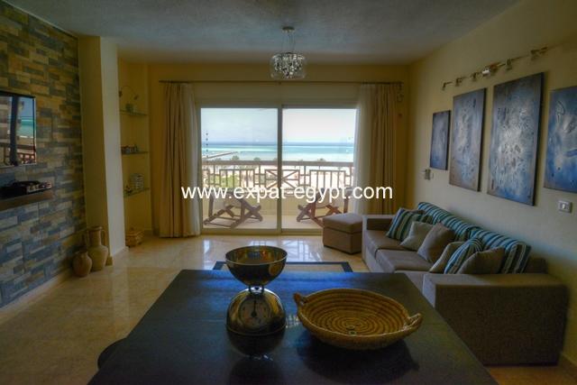 Amazing apartment for sale right on the beach in Hurghada .