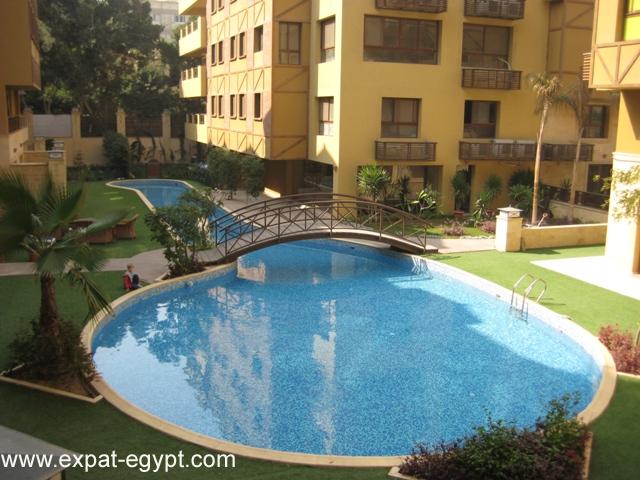 Maadi -Duplex Ground Floor in Compound with Shared Swimming Pool, 