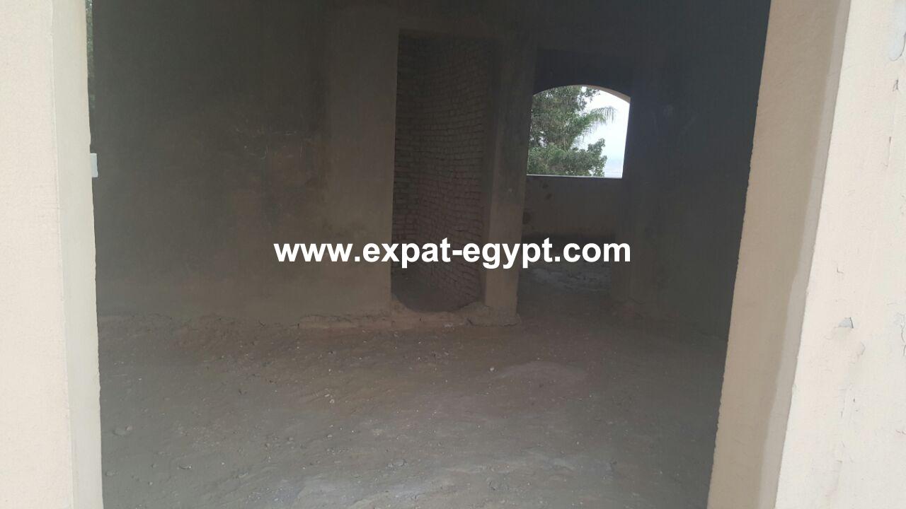Town house for sale in Utopia in 6 th of October City , Giza , Egypt .
